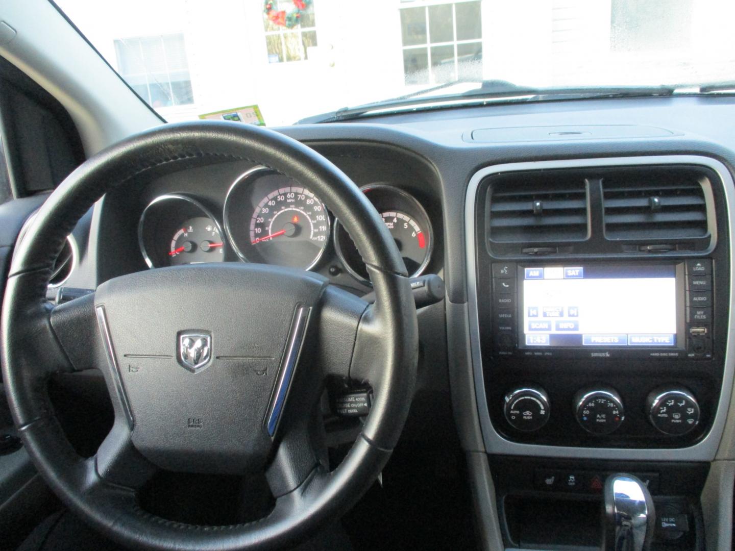 2011 BLACK Dodge Caliber Uptown (1B3CB9HB0BD) with an 2.4L L4 DOHC 16V engine, Continuously Variable Transmission transmission, located at 540a Delsea Drive, Sewell, NJ, 08080, (856) 589-6888, 39.752560, -75.111206 - Photo#15